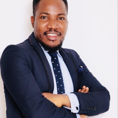 Founder/Executive Director, Research & Strategy – Dr. Elvis Ogah